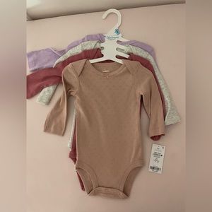 Brand new with tags Carters- 4 piece set  long sleeve onesies